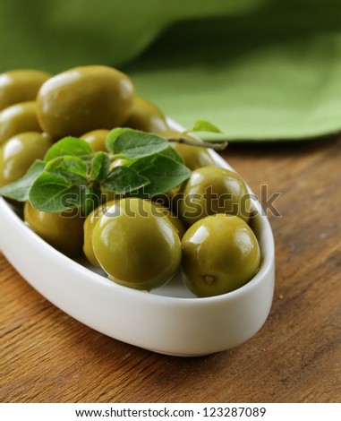 green marinated olives  with oregano