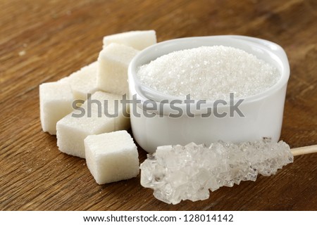 Several types of white sugar - refined sugar and granulated sugar