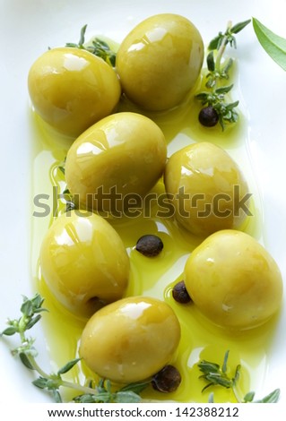green olives with fragrant oil and spices