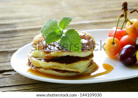 homemade pancakes with  caramel syrup - a delicious and healthy breakfast