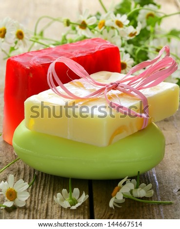 organic soap with flowers on the organic background