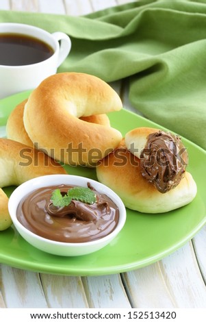 Chocolate nut paste for breakfast with bread rolls
