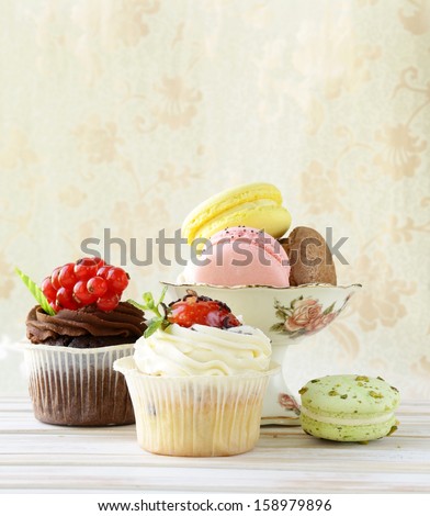 Holiday Desserts, Cupcakes And Macaroons On A Vintage Background
