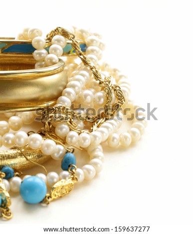 Gold, Turquoise Jewelry And Pearl, On A White Background