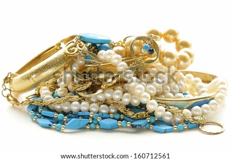 gold, turquoise jewelry and pearl,  on a white background