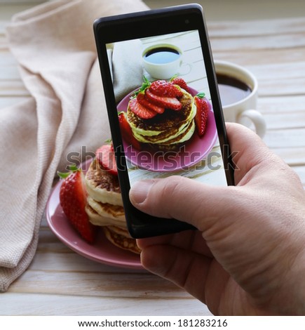 smartphone shot food photo pancakes for breakfast with fresh strawberries smartphone shot food photo pancakes for breakfast with fresh strawberries