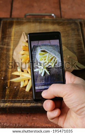 smartphone shot food photo - French fries with salt and ketchup