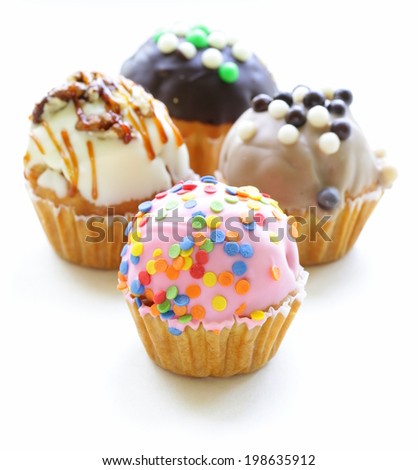 holiday desserts, different decorated cupcakes on white background