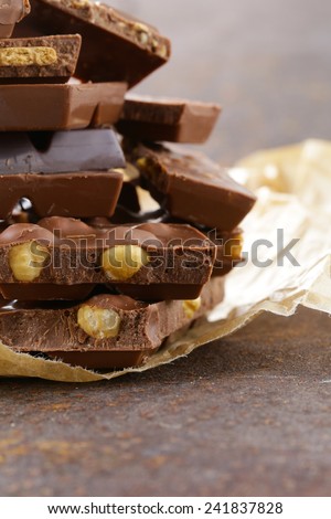 stack of bars pieces of chocolate with different flavors