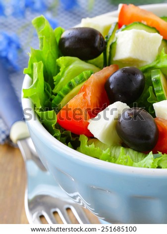 Greek salad with olives cheese and tomatoes