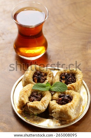 Turkish arabic dessert - baklava with honey and walnut nuts