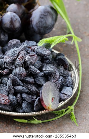 Natural organic dried grapes raisins, rustic still life