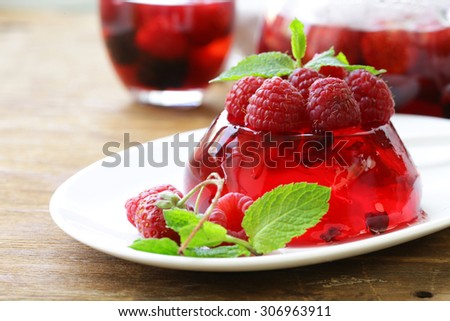 berry fruit jelly with fresh berries - summer dessert