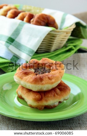 homemade fried pies with meat on the table