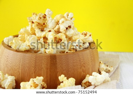 classic popcorn  in a wooden cup