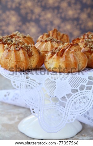 pastry eclairs profiteroles dessert plates