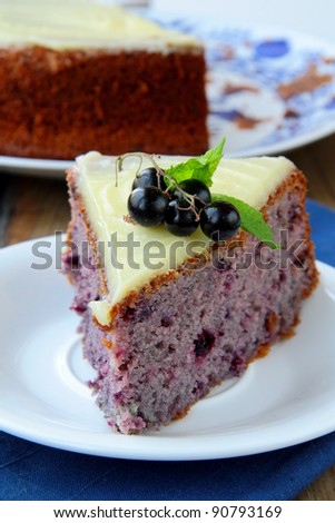 piece of fruit currant cake on white plate