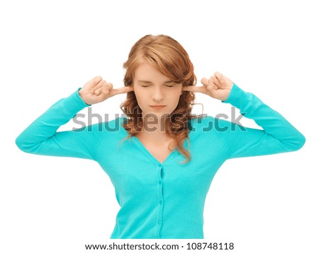 picture of student with fingers in ears.