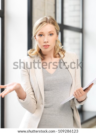 indoor picture of worried woman with documents