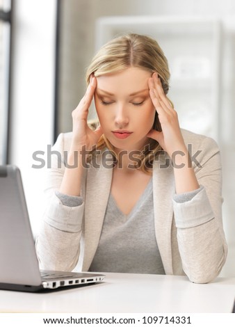 picture of tired woman with laptop computer - stock photo picture of tired woman with laptop computer - stock photo