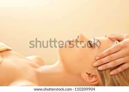 Picture Of Calm Beautiful Woman In Massage Salon
