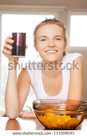 picture of smiling teenage girl with chips