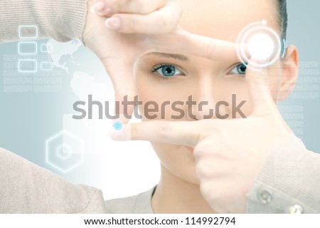 Picture Of Businesswoman Creating Frame With Fingers