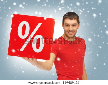 picture of handsome man with percent sign (focus on box)