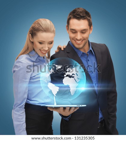 man and woman with virtual globe from tablet pc