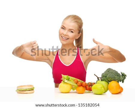 woman with fruits and hamburger showing good and bad signs