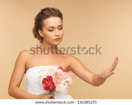picture of bride looking at wedding ring.