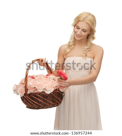 picture of young woman with basket full of flowers.