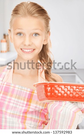 bright picture of cooking girl in kitchen