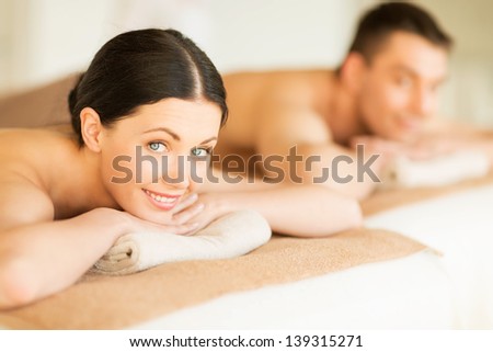 Picture Of Couple In Spa Salon Lying On The Massage Desks