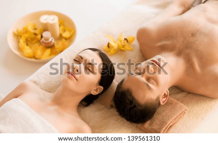 Picture Of Couple In Spa Salon Lying On The Massage Desks