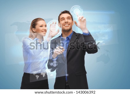 picture of two business people working with virtual screen