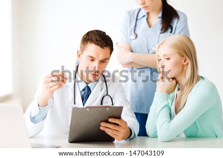 healthcare and medical concept doctor and nurse with patient in hospital healthcare and medical concept doctor and nurse with patient in hospital