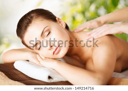 Beauty And Spa Concept - Woman In Spa Salon Getting Massage
