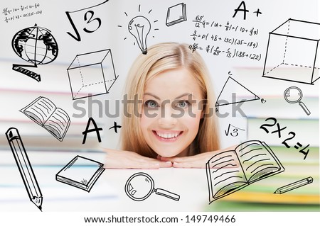 education and school concept - smiling student with stack of books and doodles