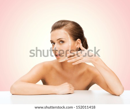 Beauty And Skin Care Concept - Face Of Beautiful Woman With Lines
