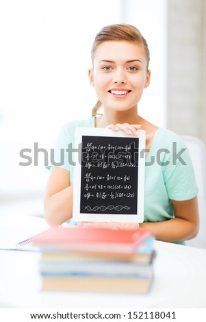 education, technology and internet concept - smiling student girl with tablet pc