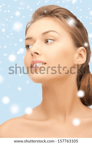health and beauty concept - clean face of young beautiful woman
