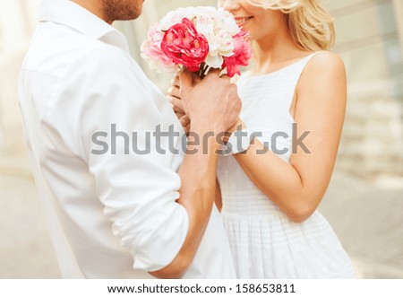 Summer Holidays, Love, Relationship And Dating Concept - Couple With Bouquet Of Flowers In The City