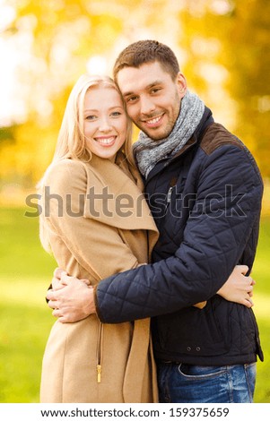 Holidays, Love, Travel, Tourism, Relationship And Dating Concept - Romantic Couple In The Autumn Park
