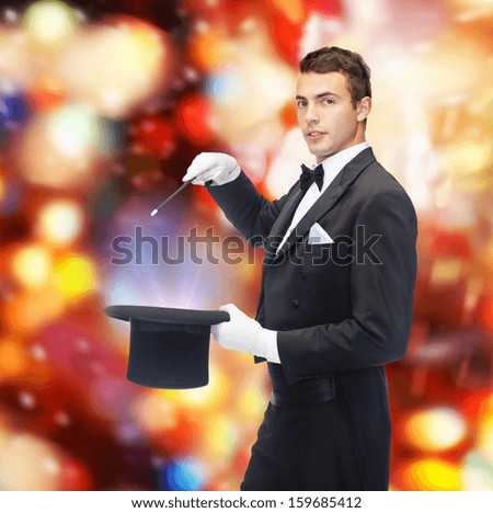 Performance, Circus, Show Concept - Magician In Top Hat With Magic Wand Showing Trick