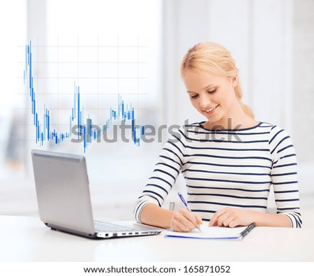 business, education, money and technology concept - smiling student with laptop computer, notebook and forex chart in college