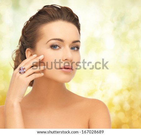 Bride And Wedding Concept - Beautiful Woman With Purple Cocktail Ring