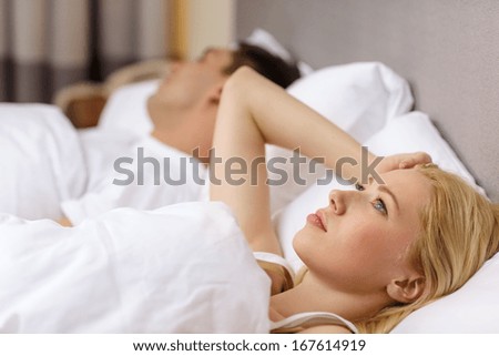 Hotel, Travel, Relationships, And Problems With Sleep Concept - Family Couple In Bed, Woman With Insomnia