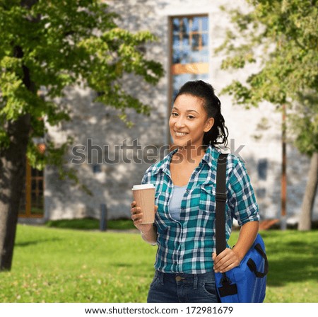 education, technology and people concept - smiling female african american student with bag and take away coffee cup