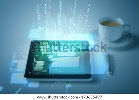 business and technology concept - tablet pc with cup of coffee